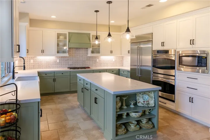 Gourmet kitchen with Wolff cooktop.