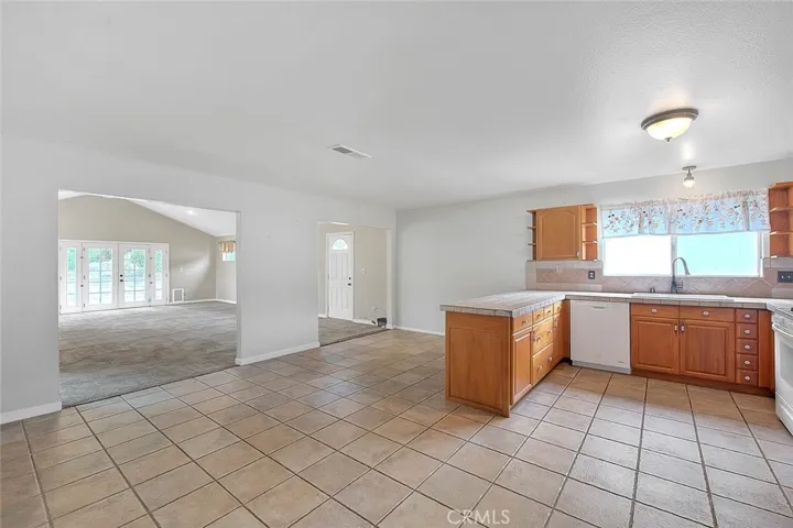 View to expanded family room from kitchen/dining room