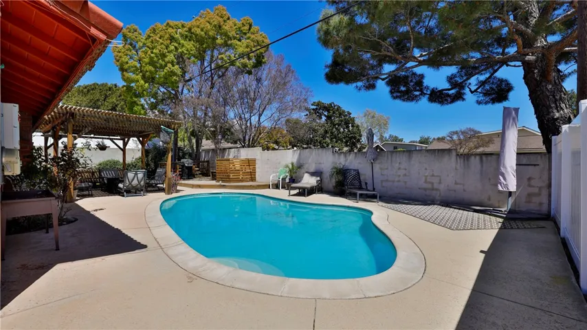 Stunning View of Backyard, Blue Skies & Trees