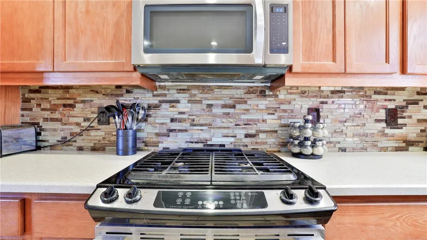 Kitchen Stove, Microwave, Beautiful Backsplash