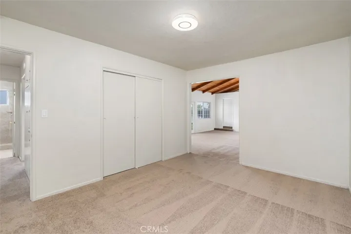 Bedroom that leads to the huge familygame room