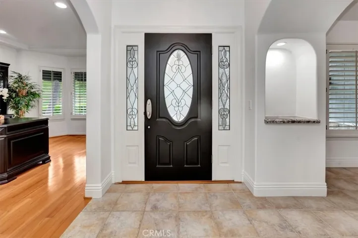 .  Step inside & be greeted by a sophisticated floor plan featuring a formal entry.