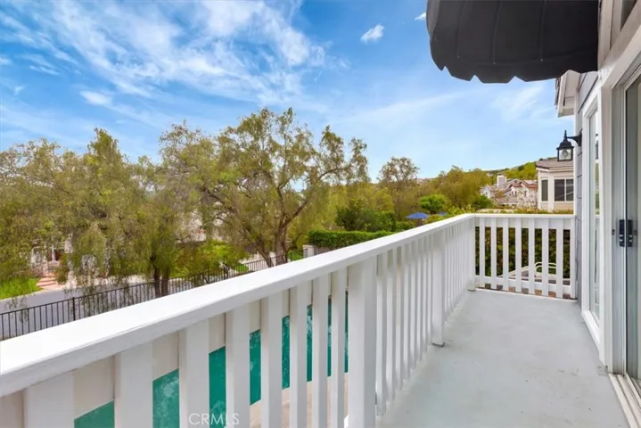 Balcony overlooking the views & backyard.