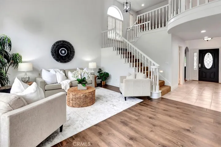 Formal living room with 2-story ceilings.