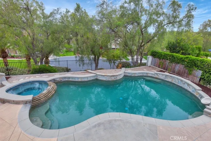 This private paradise boasts no direct neighbors behind or in front, ensuring tranquility.