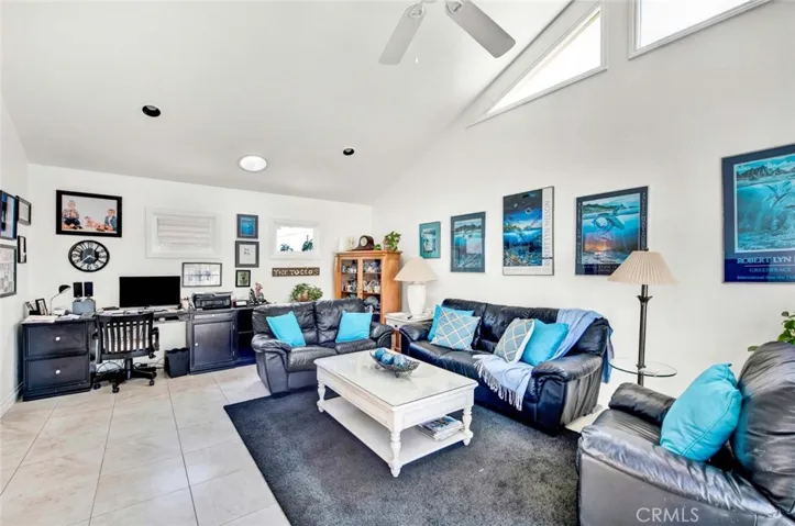 Family Room With Recessed Lighting And Tile Floors