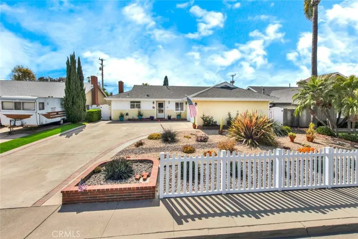 Front Of House With Low Watering Landscaping