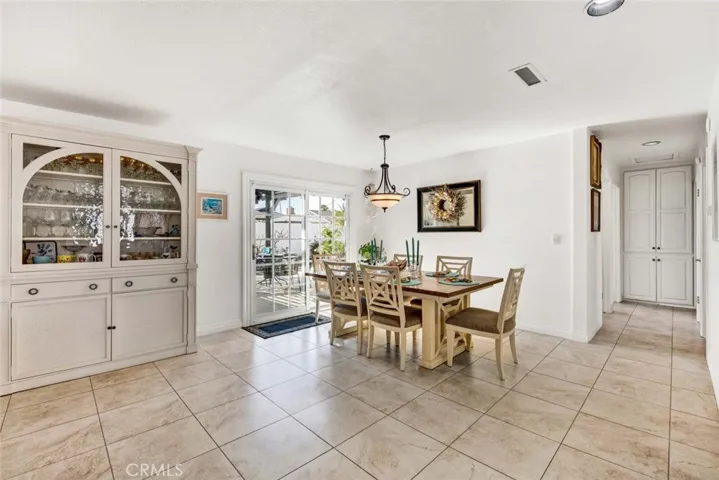 Dining Room With Slider To Backyard