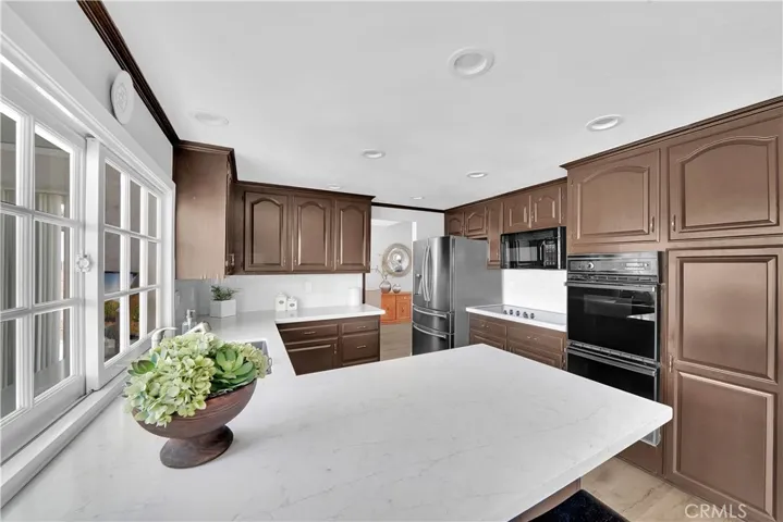  A peninsula overlooks the separate family room