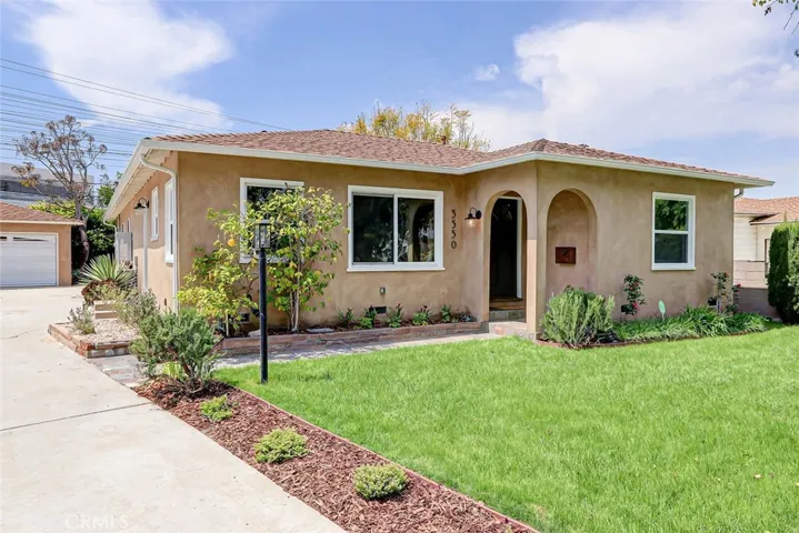 Enjoy this extra large lot on a tree-lined street