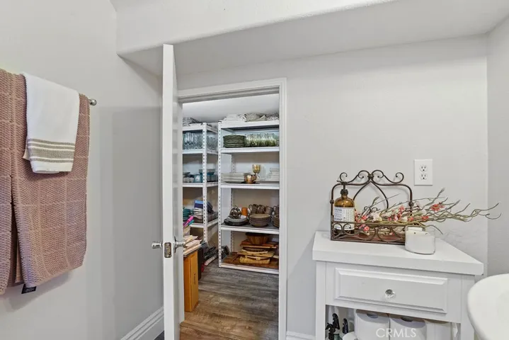 Storage Closet in Downstairs Bathroom