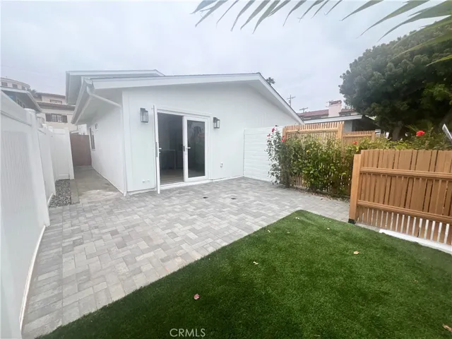 Unit A has direct access to it's own private backyard.