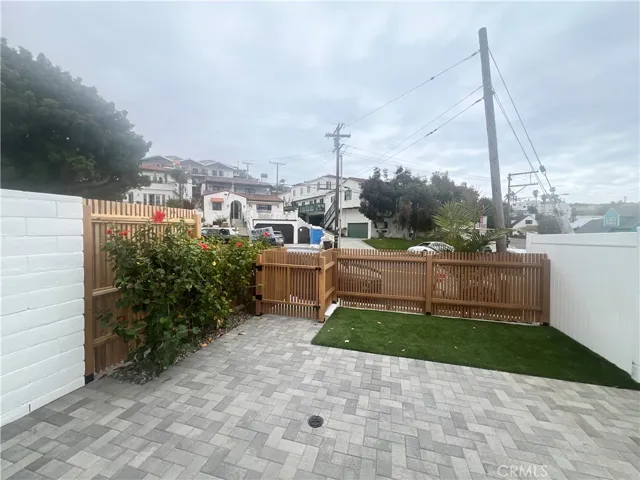 Unit A has direct access to it's own private backyard.