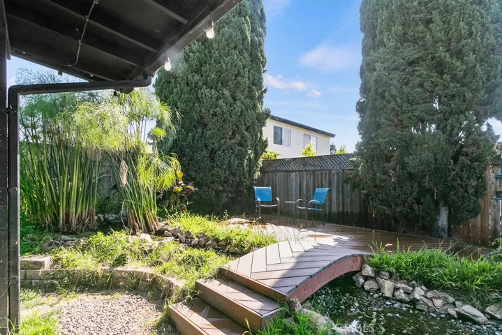 The deck is the perfect place to relax and listen to the sound of running water.