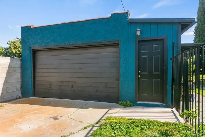 Detached garage, side door leads to laundry room.