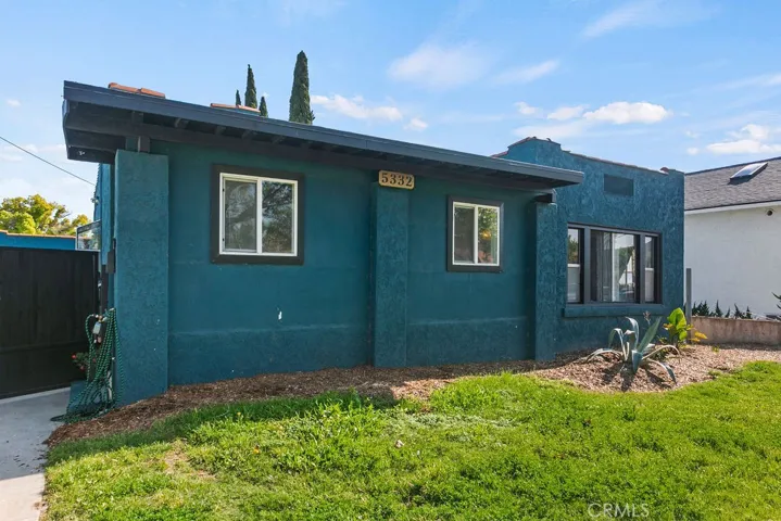 Home is located in a vibrant neighborhood surrounded by restaurants and shopping.