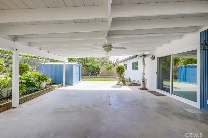 Backyard: Covered Patio, Shed and Lawn