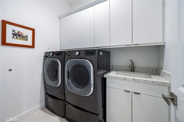Laundry room with sink