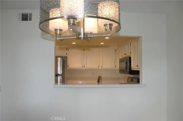 Pass through between kitchen and Dining Room