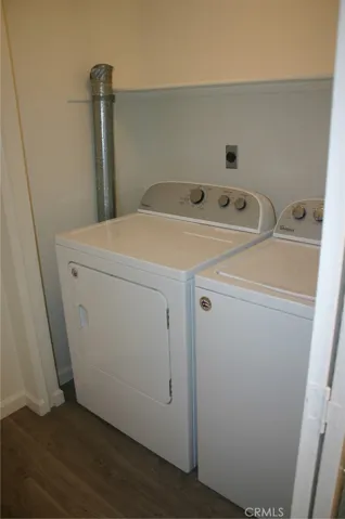 Laundry in the hall between the garage