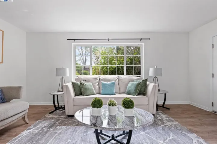 Living room with window to greenbelt
