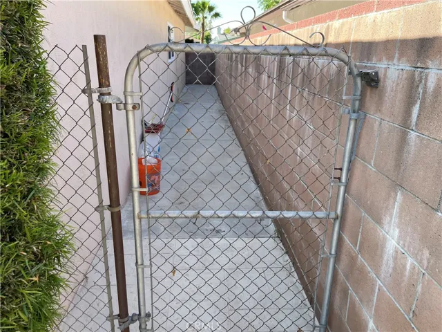 Dog run on side of house