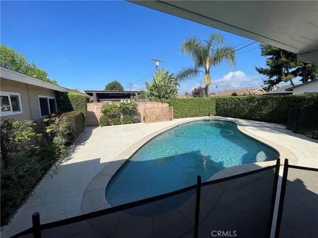 Pebble Tech fenced in pool