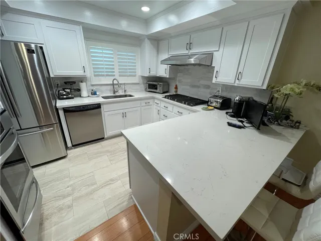 Remodeled kitchen with stainless steel appliances