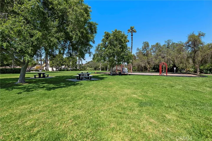 Playground and picnic table area in beautiful Briosa