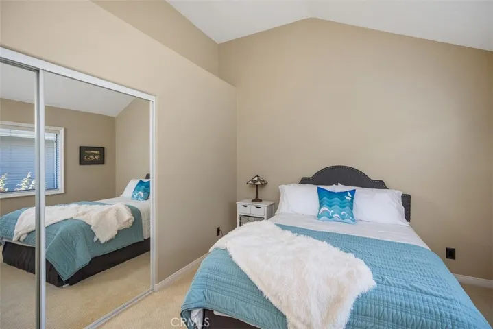 Main level bedroom with closet