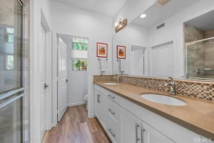 Primary restroom + walk-in closet.