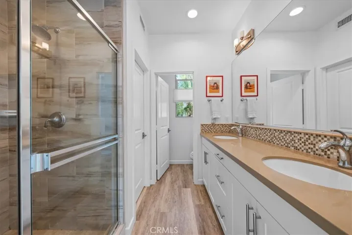 Primary restroom + walk-in closet.