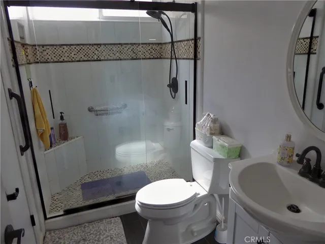 Master Bathroom with Remodled Shower, Toilet & Sink.