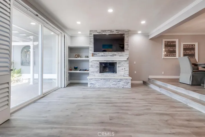Gas Fireplace, recessed lighting, wood plantation shutters!
