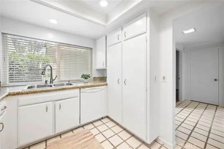 Kitchen opens onto front courtyard