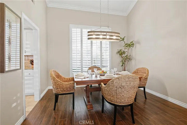 Open dining area adjacent to the beautiful kitchen.