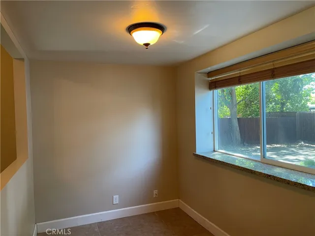 Spacious room for home office, play area or craft room.
