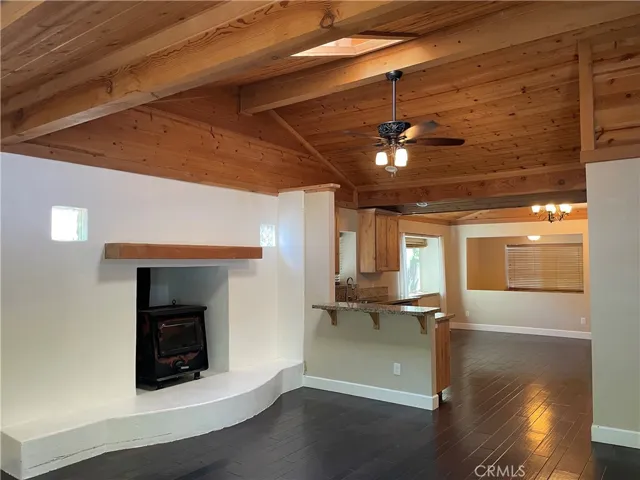 Family room with knotty pine vaulted ceiling