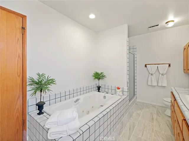 Add a few candles and get lost in a relaxing soak in the tub