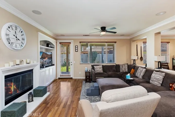 Family Room with Fireplace. Door to backyard.
