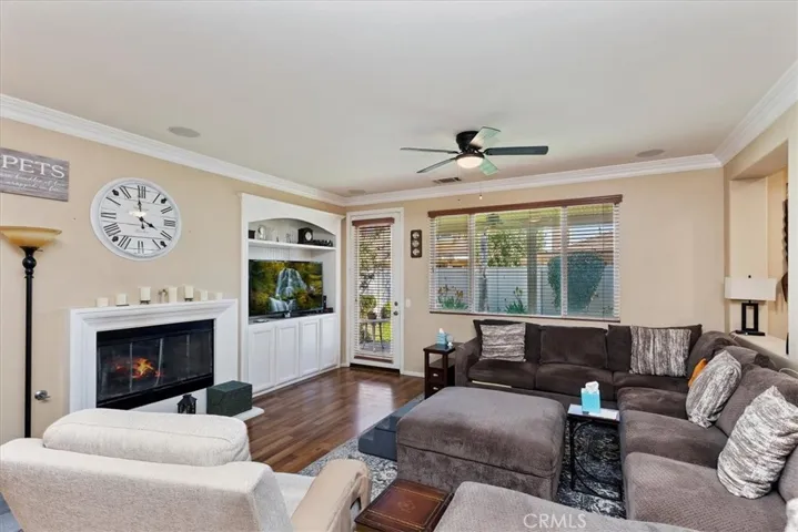 Family Room with Fireplace. Door to backyard.