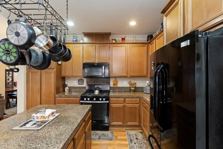 Kitchen with granite countertops and Island.