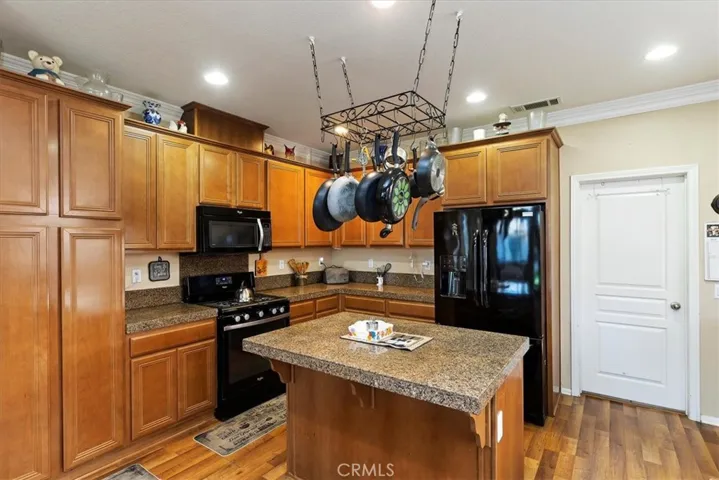 Kitchen with granite countertops and Island.