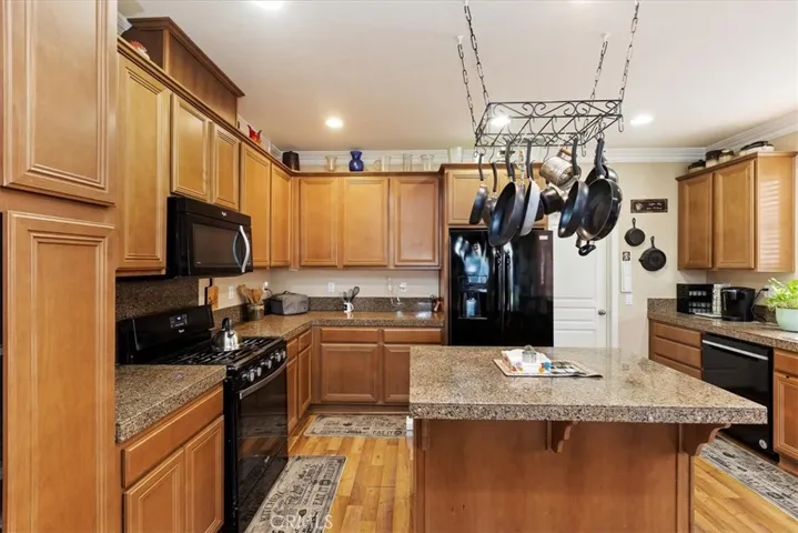 Kitchen with granite countertops and Island.