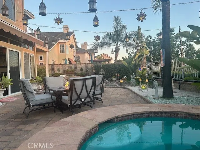 Enjoy the sunsetting in the backyard and watch the garden area come alive