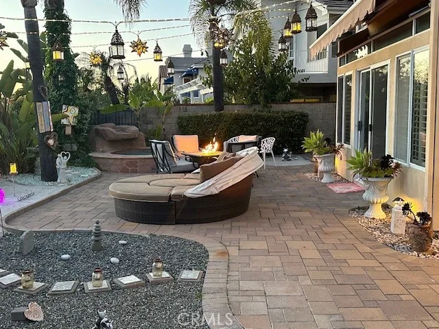 Pavers surround the rock garden areas