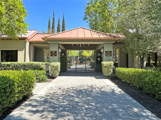 Gates to the Canyon Crest Estates Club House offering a full on Meeting Room with Kitchen, Work-out Gym, Tennis Courts, Pool including a Lap Pool, Spa, Tot Lot, Library, Billiard Room and More