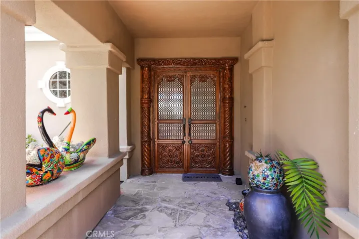 One of a Kind Front Door with its Uniqueness sets the Unique Feeling that awaits you inside this Exquisite Sanctuary offering a Peaceful Enviroment to Enjoy