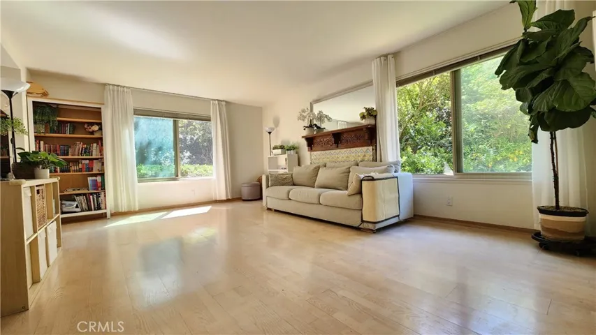Spacious living room with 2 huge windows