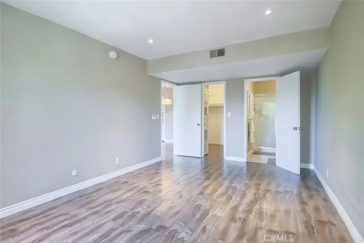 Primary bedroom1 with walk-in closet and en-suite bathroom